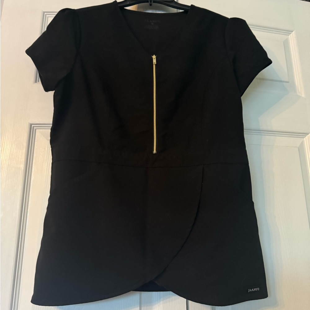 Peplum half zip scrub top